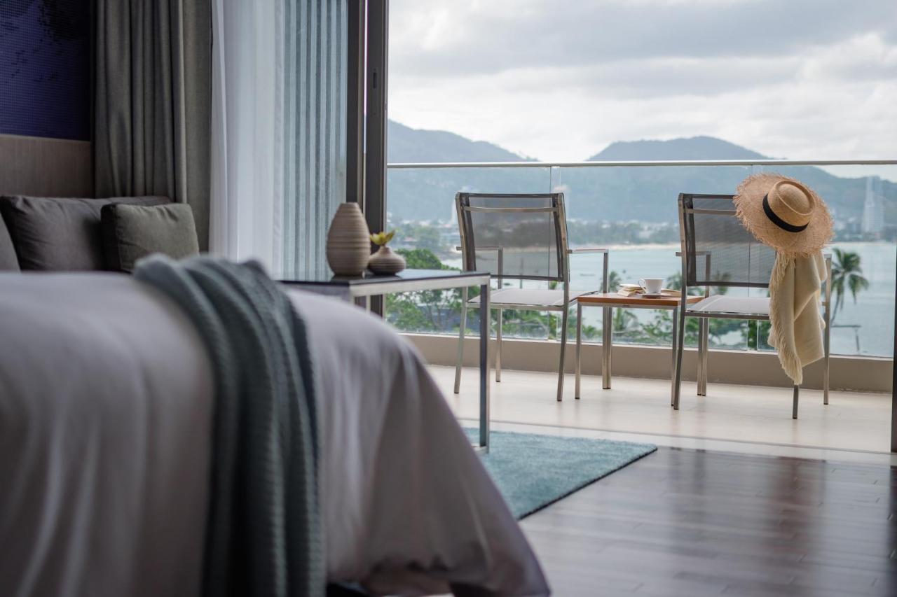 Oceanfront Beach Resort - Sha Extra Plus Patong المظهر الخارجي الصورة A bedroom at The View