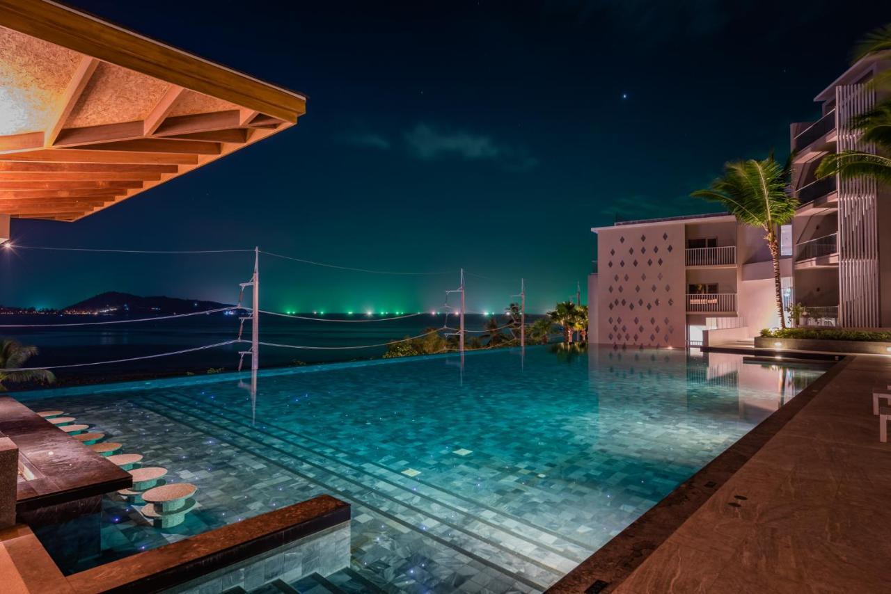 Oceanfront Beach Resort - Sha Extra Plus Patong المظهر الخارجي الصورة Infinity pool at the resort