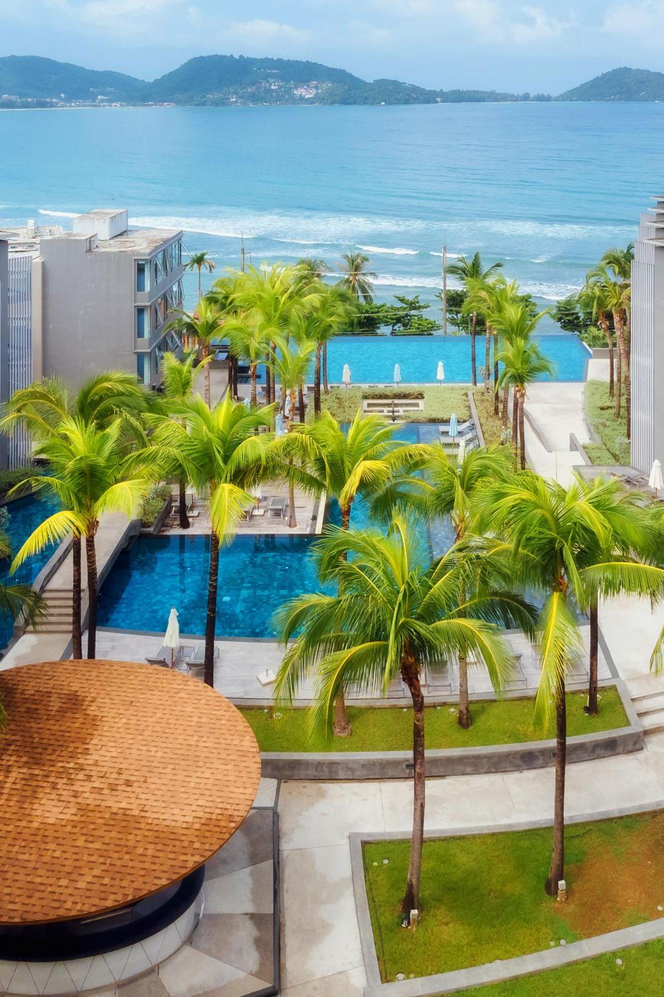 Oceanfront Beach Resort - Sha Extra Plus Patong المظهر الخارجي الصورة The swimming pool at the resort