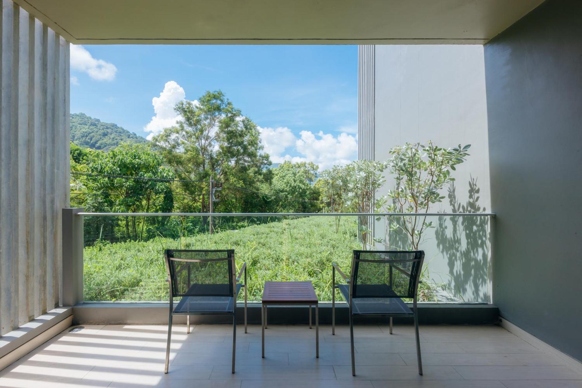 Oceanfront Beach Resort - Sha Extra Plus Patong الغرفة الصورة View from a room at the hotel