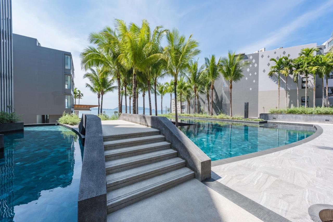 Oceanfront Beach Resort - Sha Extra Plus Patong المظهر الخارجي الصورة The swimming pool at the resort